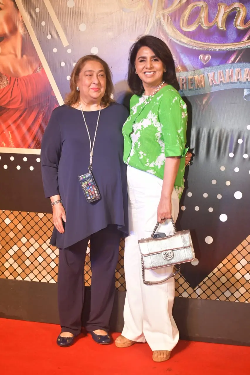 Bollywood's ever-graceful Neetu Kapoor stole the spotlight at the grand premiere of 'RARKPK' with her timeless elegance and radiant smile.